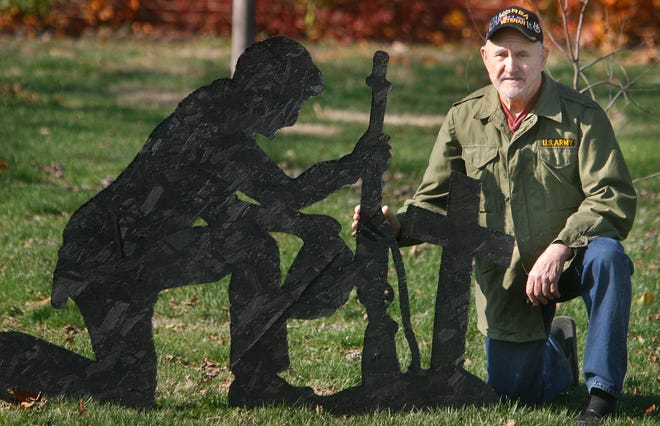 Korean War veteran Ivan Maras has a homemade soldier memorial that he displays in front of his Rochester home for Veterans Day and Memorial Day.