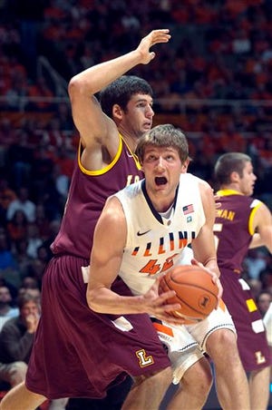 Illinois' Tyler Griffey (42) drives against Loyola's Ben Averkamp (24) during the first half of an NCAA college basketball game in Champaign, Ill., Friday, Nov. 11, 2011.