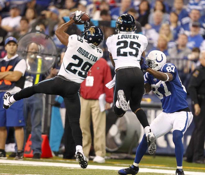 Michael Conroy Associated Press A leaping interception by the Jags' William Middleton was negated by a penalty for having too many players on the field.