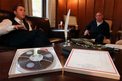 Nathan Raab, left, and his father Steven Raab, talk about their recently discovered White House communications tapes involving Air Force One in flight from Dallas on November 22, 1963, during an interview at their office, in Philadelphia, on Wednesday Nov. 9, 2011. (AP Photo/ Joseph Kaczmarek)