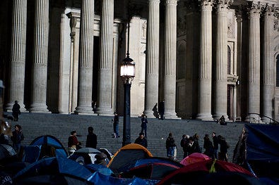 The Occupy London demonstrators have been encamped near St. Paul's Cathedral for a month, but their fate is uncertain.
