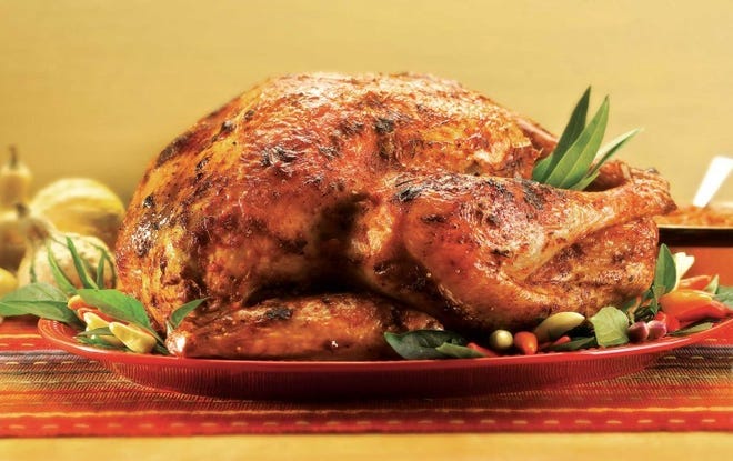 Whether traditionally prepared or not, roasted turkey takes
center stage at Thanksgiving.
