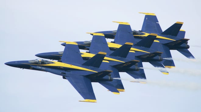 Members of the U.S. Navy Blue Angels precision flying team. 
AP Photo/Danny Johnston