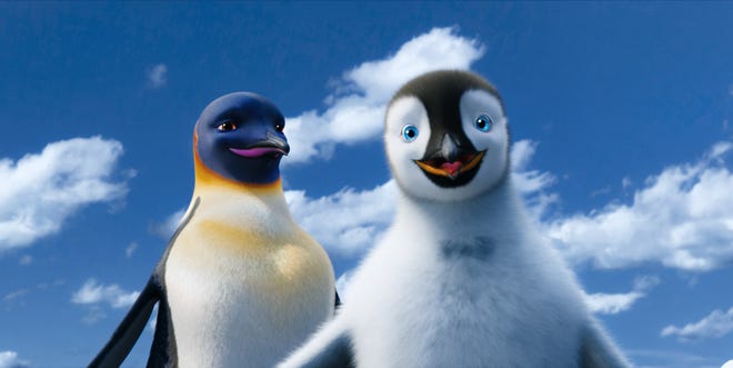 Gloria, voiced by Alecia "P!nk" Moore, left, and Mumble, voiced by Elijah Wood, are shown in a scene from the animated feature "Happy Feet Two."