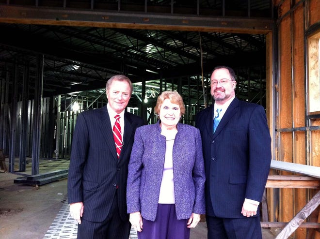 From left, Backus Board Chairman Peter Disch, Backus Auxiliary President Yvette Jacaruso and Backus President and CEO David Whitehead stand at the future site of the Backus Emergency Care Center in Plainfield. The auxiliary announced Wednesday it will donate $250,000 to the project.