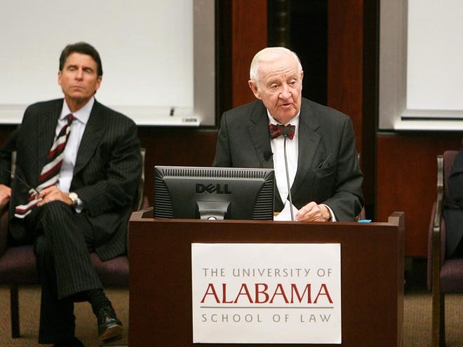 Retired Supreme Court Justice John Paul Stevens, right, the third-longest serving justice in the court's history, speaks at the University of Alabama School of Law on Wednesday.