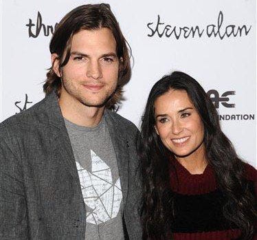 In this April 14, 2011 file photo, Ashton Kutcher and Demi Moore attend the "Real Men Don't Buy Girls" launch party, to raise awareness about child sex slavery, at the Steven Alan Annex in New York.