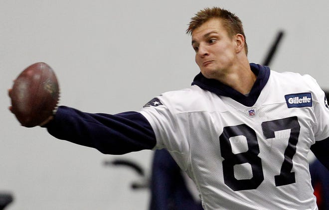 New England Patriots wide receiver Rob Gronkowski makes a catch during NFL football practice in Foxborough, Mass., Wednesday, Nov. 16, 2011. (AP Photo/Charles Krupa)
