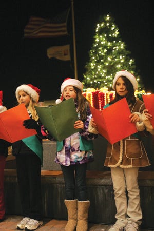 Photo by Amy Herzog/New Jersey Herald
 
 Girl Scouts from Troop 803 in Sandyston sing Christmas carols at Newton Medical Center during the Festival of Lights Saturday.