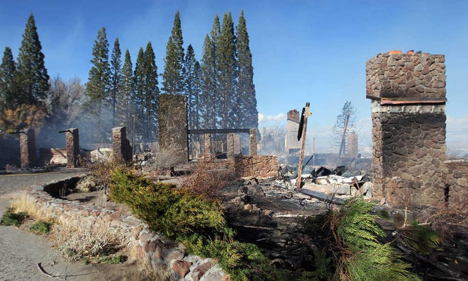 A home on Windy Hill in south Reno was one of at least 25 homes destroyed by a wildfire.
