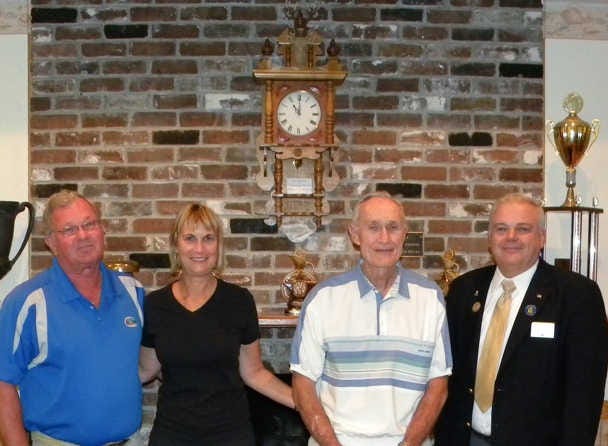 At the presenttion of the clock were Barry Masters, from left; Cheryl Thigpen, Bernard's nephew and daughter; Bernard Masters and Gene Rittenhouse the Elks Lodge leading knight,
