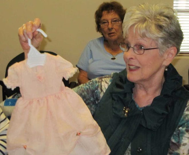 Rowena Scott showing the group her American Girl Dress.