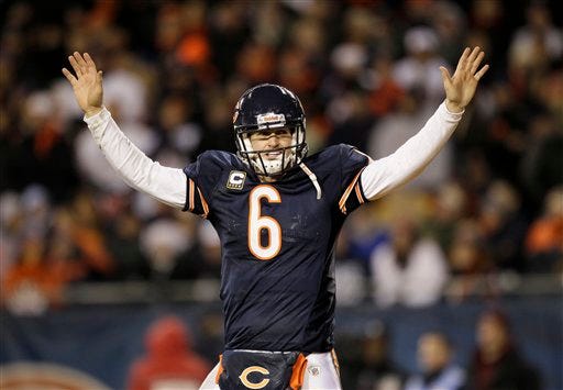 Chicago Bears quarterback Jay Cutler (6) tries to quiet down fans in the second half of an NFL football game against the San Diego Chargers in Chicago, Sunday, Nov. 20, 2011. (AP Photo/Nam Y. Huh)