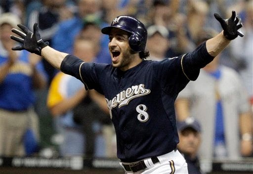 In this Sept. 13, 2011 file photo, Milwaukee Brewers' Ryan Braun reacts after hitting a game-winning home run during the 11th inning of a baseball game against the Colorado Rockies, in Milwaukee. Braun won the National League MVP Award in voting announced Tuesday, Nov. 22, 2011.