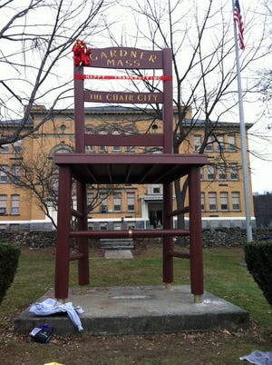 The Big Chair in front of Helen Mae Sauter School on Elm Street has been refurbished in time for Thanksgiving.