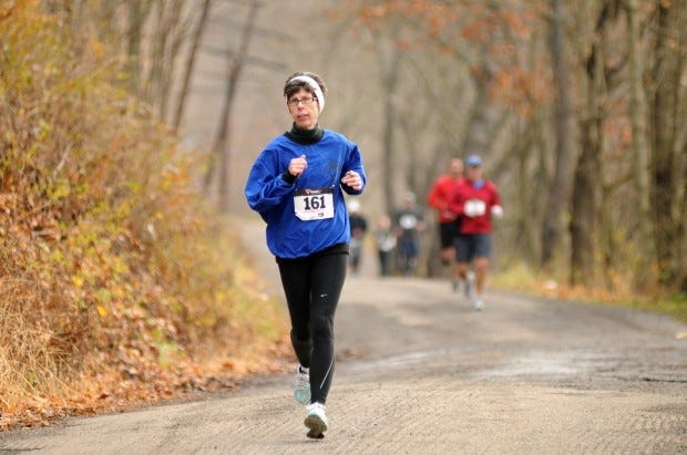 Sally Dexter of New Castle on Waterfront Road during the annual
Thanksgiving Day race.