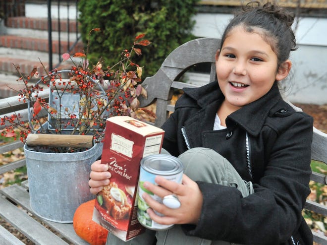 Claudia, age 9, a student at Northwest Elementary School, knows the importance of giving during this Thanksgiving holiday.