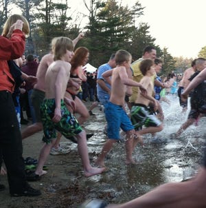 Dippers race into Quaddick Pond on Thursday morning in Thompson.