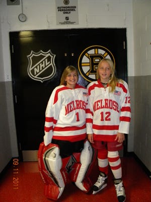 Hannah Aveni and Hannah Walsh represented the Melrose Youth Hockey Girls program in the Mini 1-on-1 shootout at the TD Bank Boston Garden, Sept. 11.