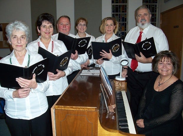 The Ellwood City Area Civic Chorale will kick of its 2011
Christmas concert season at 7 p.m. Sunday at the First United
Methodist Church, 416 Crescent Ave., Ellwood City. The concert,
which is free and open to the public, will feature a mixture of
sacred and secular music. Among those performing will be, from
left, Rosetta Herbert; Pina Riccio; Chuck Schweinsberg; Joyce
Turner Gindlesperger, director; Lynda Brenner; Dale Newton; Cindy
Cotherman, accompanist. Other performances will be at 7 p.m. Dec. 4
at Zion Lutheran Church in Zelienople; 6 p.m., Dec. 11 at New
Brighton Free Methodist Church; 2 p.m., Dec. 18 at Slippery Rock
Presbyterian Church, Wayne Township; and 6 p.m. Dec. 18 Riverview
United Methodist Church, Patterson Township.