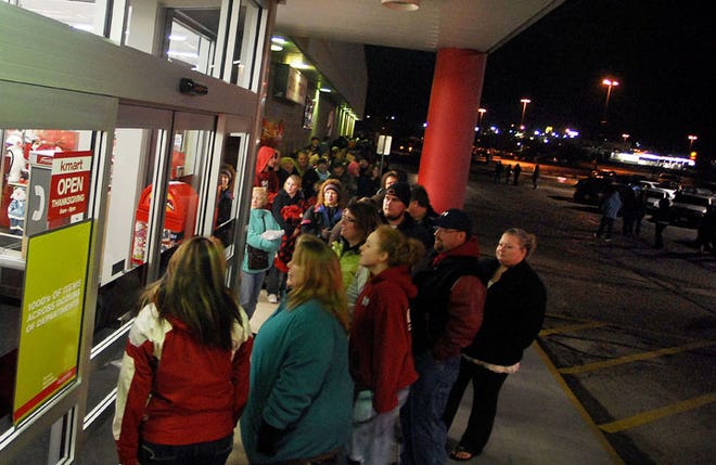 Shoppers line up outside of K-Mart in Freeport in anticipation of the store's 5 a.m. Black Friday opening.