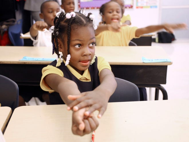 MaKalya Brooks does a drill at Holmes Elementary School in Miami on Sept. 1. (The Associated Press)