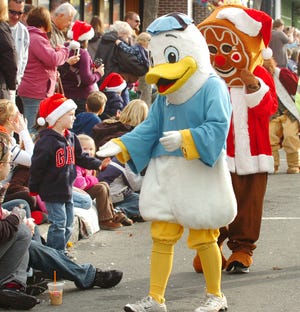 Characters greeted spectators along the parade route. The annual Quincy Christmas Parade was held Sunday, November 27, 2011.