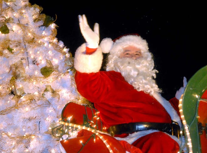 Santa during the 10th annual Holiday Dazzle Light Parade in Downtown Putnam Sunday night.