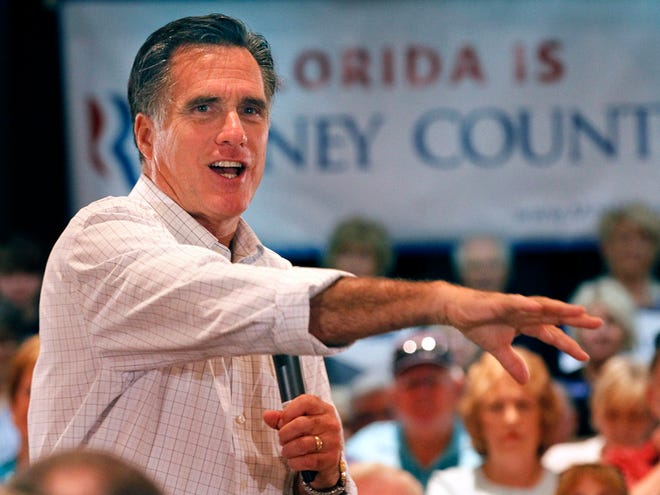 In this Oct. 4, 2011 file photo, Republican presidential candidate former Massachusetts Gov. Mitt Romney speaks at a town hall meeting in The Villages. (AP File)