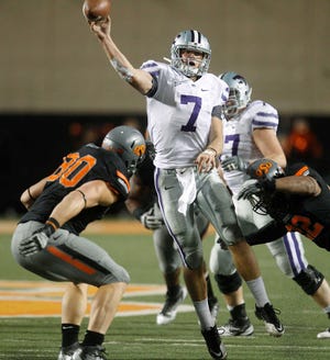 Kansas State quarterback Collin Klein passes against Oklahoma State during the Wildcats' 52-45 loss on Nov. 5.
