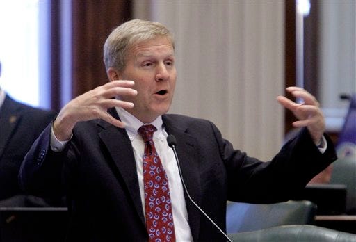 Illinois House Minority Leader Tom Cross, R-Oswego, argues legislation while on the House floor during veto session at the Illinois State Capitol Tuesday, Nov. 29, 2011, in Springfield, Ill. (AP Photo/Seth Perlman)