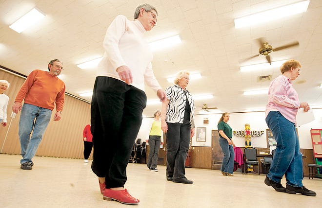 Instructor Jerrie Roe leads the Pekin Line Dancers in a dance called “Mambo #5” at the Miller Center Thursday. The group meets Thursdays at 2 p.m. and 6:30 p.m.