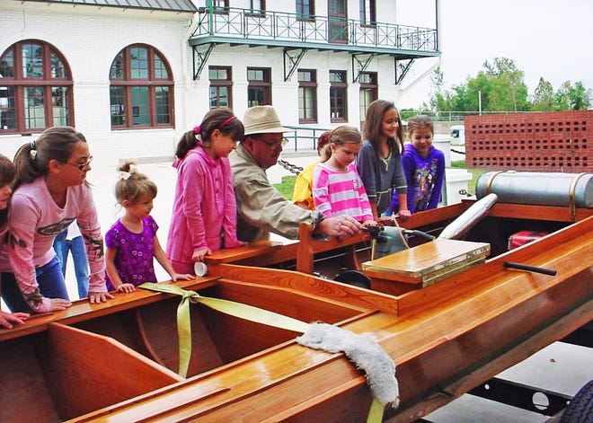 Wooden boats will be on display Saturday at the Plaquemine Lock State Historic Site as part of the Christmas Festival.