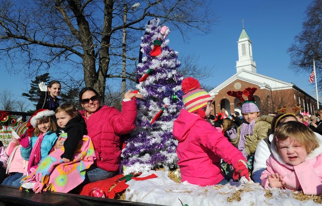 Julie's School of Dance members ride a float in the 28th annual East Bridgewater Christmas Parade.