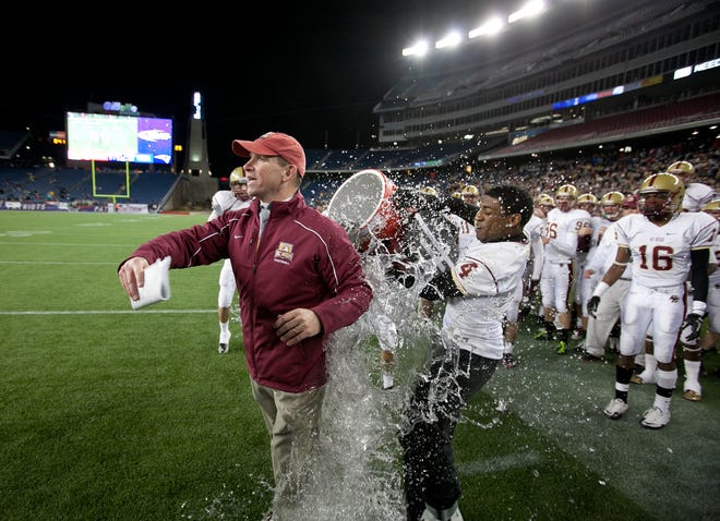 Preston Cooper dunks BC High head coach Jonathan Bartlett at the end of the EMass Division 1 Super Bowl at Gillette Stadium in Foxboro on Saturday, Dec. 3, 2011.