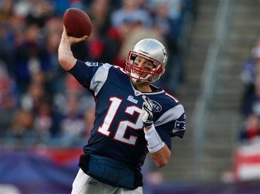 Patriots quarterback Tom Brady throws a pass during Sunday's game.