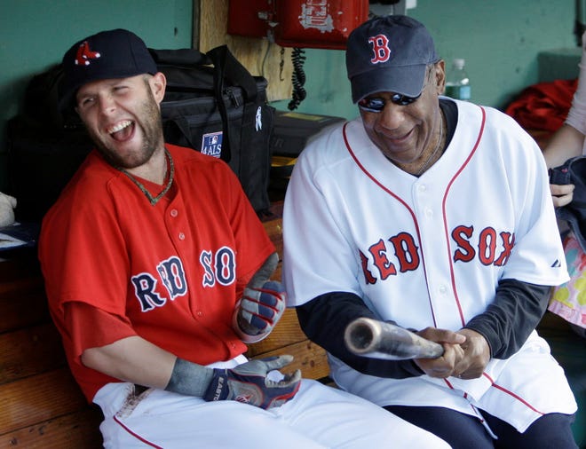Comedian and baseball fan extraordinaire Bill Cosby shares a laugh with Dustin Pedroia during the 2009 season. Cosby spoke recently about baseball and his childhood in the Philadelphia projects.