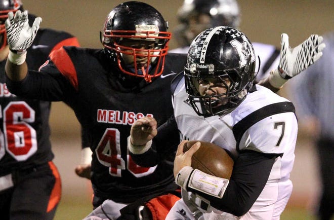 Melissa's Angelo Robison goes for the tackle on Muleshoe's Beau Avila during their Class 2A Division I state semifinal game Friday at the Mustang Bowl in Sweetwater. Melissa ended the Mules' season, 49-36.
