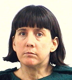 A Feb. 13, 2010, police booking photograph of Amy Bishop, who's accused of killing three people at the University of Alabama-Huntsville, where she was a professor.