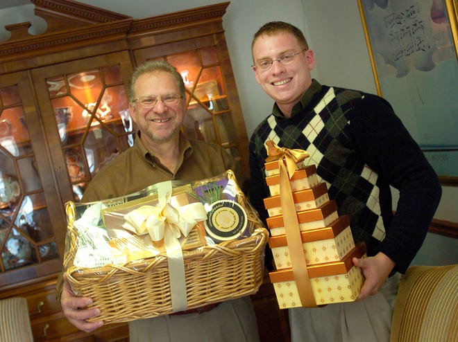 Ron and Josh Orleans, father-son duo behind Gifts on Time, a Scituate company that automatically sends out corporate gifts for its customers.Monday December 5, 2011.

Greg Derr/ The Patriot Ledger
BIZ story