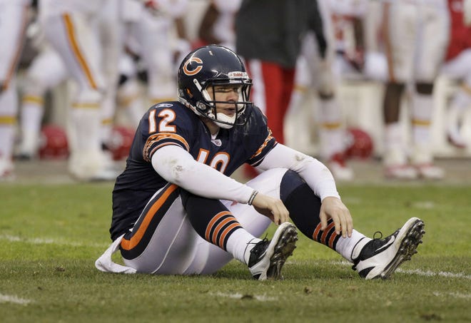Chicago Bears quarterback Caleb Hanie sits on the field after getting tackled in the second half of the game Sunday, Dec. 4, 2011, against the Kansas City Chiefs at Soldier Field.