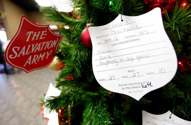 A Salvation Army angel tree sits with gift requests in the lobby of Bodyworks on 34th Street Thursday. (Stephen Spillman)