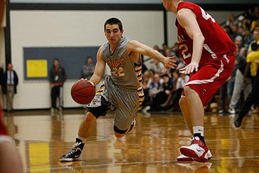 Photo courtesy of Ithaca College — Sparta native Sean Rossi, a junior point guard at Ithace College, continues to impress with his playmaking ability. He averaged 9.7 assists last year and is currently averaging 8.3 assists this season.
