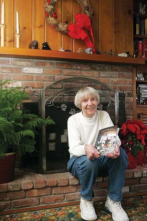 Photo by Amy Herzog/New Jersey Herald - Peggy Kurlander shows her new book, “The Tow and I,” which tells the story of Vernon’s ski resorts in a humorous way. Kurlander’s husband, Jack, founded Vernon’s ski areas and many of his adventures are featured.