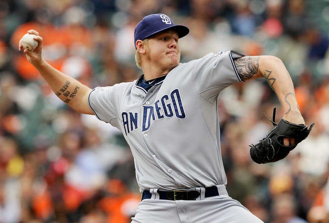 The Cincinnati Reds acquired the 24-year-old Mat Latos on Saturday for a package that includes infielder Yonder Alonso and catcher Yasmani Grandal, both first-round picks, along with starting pitcher Edinson Volquez.