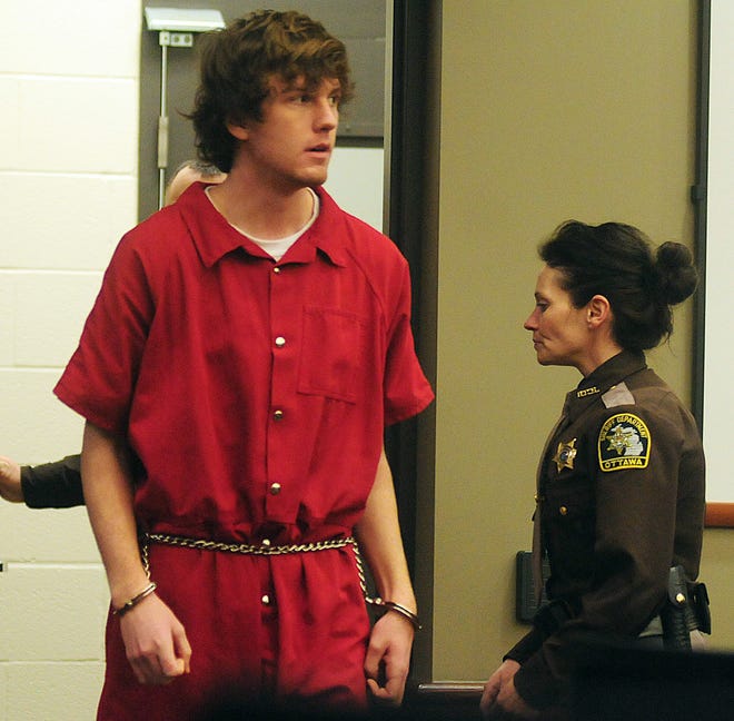 Alexander Brock enters the court room during a bond hearing Tuesday afternoon.
