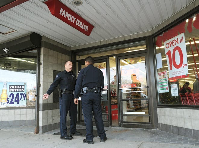 Brockton police investigate the scene. Armed robbery at the Family Dollar store at 190 Oak Street in Brockton, on Thursday, December 22, 2011. (Marc Vasconcellos/The Enterprise)*WITH VIDEO*