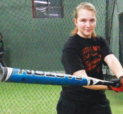 15-year-old Grace Oliver gets in some swings at Union Square Sports Hub during the off-season. PHOTOGRAPHY BY CAROLINE KERAS