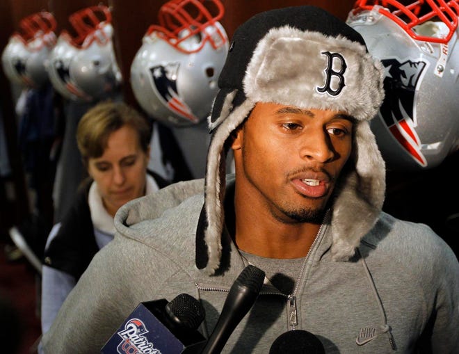 New England Patriots wide receiver Tiquan Underwood responds to a reporter's question in the locker room at the NFL football team's facility in Foxborough, Mass., Wednesday, Dec. 21, 2011. (AP Photo/Steven Senne)