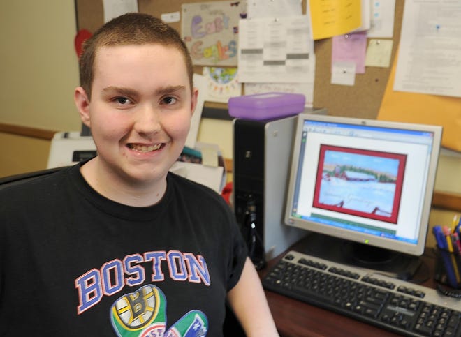 Dominic James Ricci, a student at East Middle School in Brockton, on Tuesday, Dec. 20, 2011. Dominic designed the artwork for cards for Special Olympics of Massachusetts. (Marc Vasconcellos/The Enterprise)